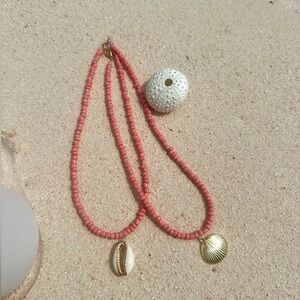 cowry shell pink necklace with gold trim🌞